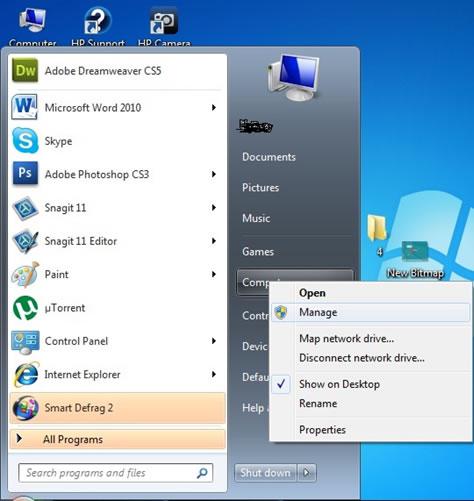 Right click computer and select manage